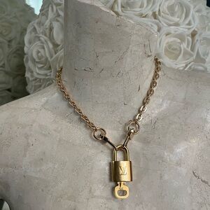 Louis Vuitton lock and key necklace and chain belt accesories